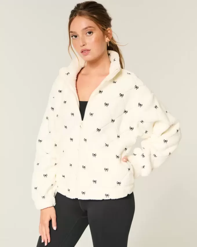 Gilly Hicks – Top con cremallera y bordado de sherpa Gilly Hicks – Top con cremallera y bordado de sherpa