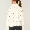 Gilly Hicks – Top con cremallera y bordado de sherpa Gilly Hicks – Top con cremallera y bordado de sherpa