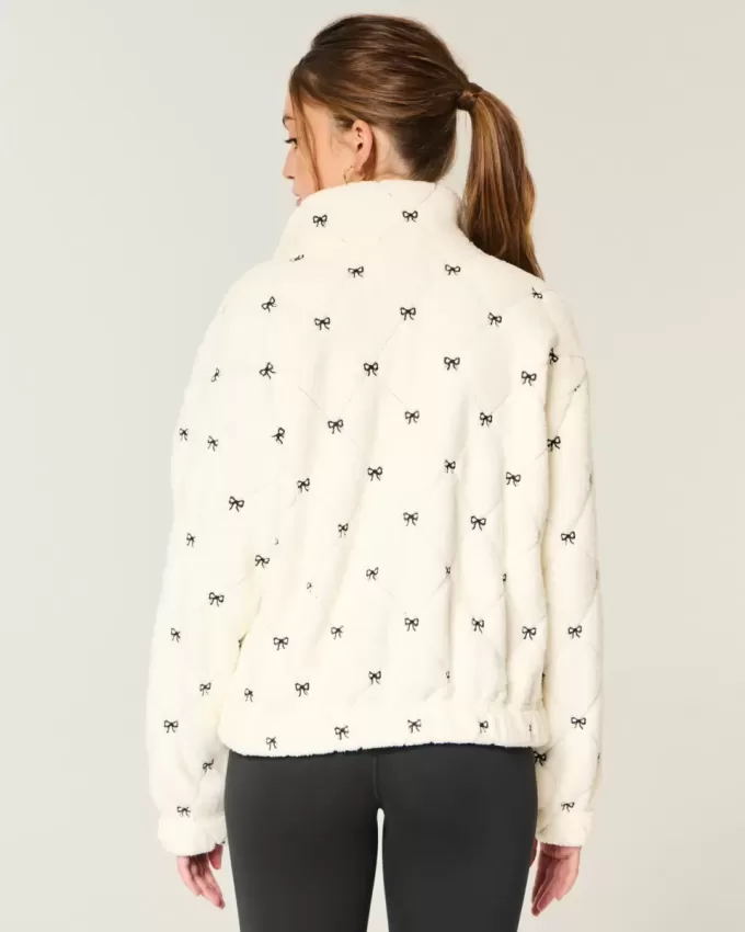 Gilly Hicks – Top con cremallera y bordado de sherpa Gilly Hicks – Top con cremallera y bordado de sherpa