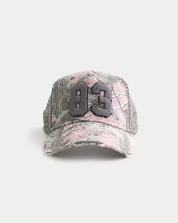 Gorra de camionero con gráfico de números y camuflaje rosa