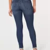 Leggings vaqueros de tiro alto con lavado oscuro Leggings vaqueros de tiro alto con lavado oscuro