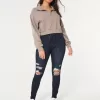 Leggings vaqueros de tiro alto con lavado oscuro y rotos con curvas Leggings vaqueros de tiro alto con lavado oscuro y rotos con curvas