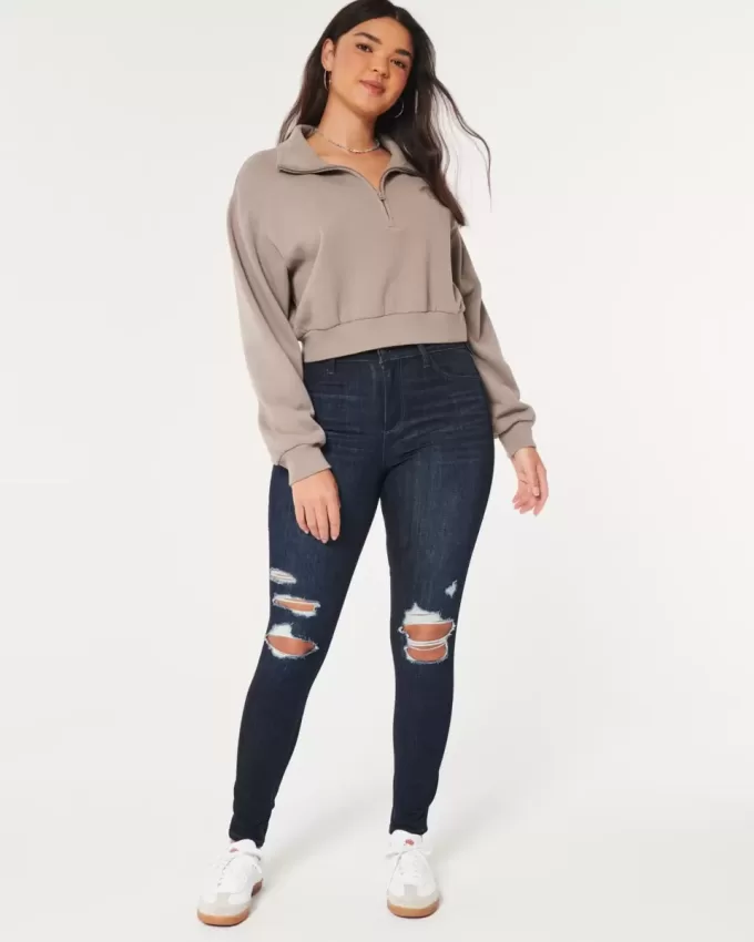 Leggings vaqueros de tiro alto con lavado oscuro y rotos con curvas Leggings vaqueros de tiro alto con lavado oscuro y rotos con curvas