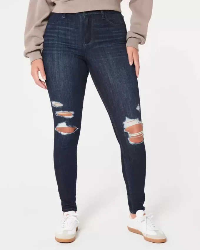Leggings vaqueros de tiro alto con lavado oscuro y rotos con curvas Leggings vaqueros de tiro alto con lavado oscuro y rotos con curvas
