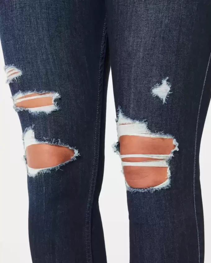 Leggings vaqueros de tiro alto con lavado oscuro y rotos con curvas Leggings vaqueros de tiro alto con lavado oscuro y rotos con curvas