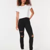 Leggings vaqueros negros rotos de tiro alto Leggings vaqueros negros rotos de tiro alto