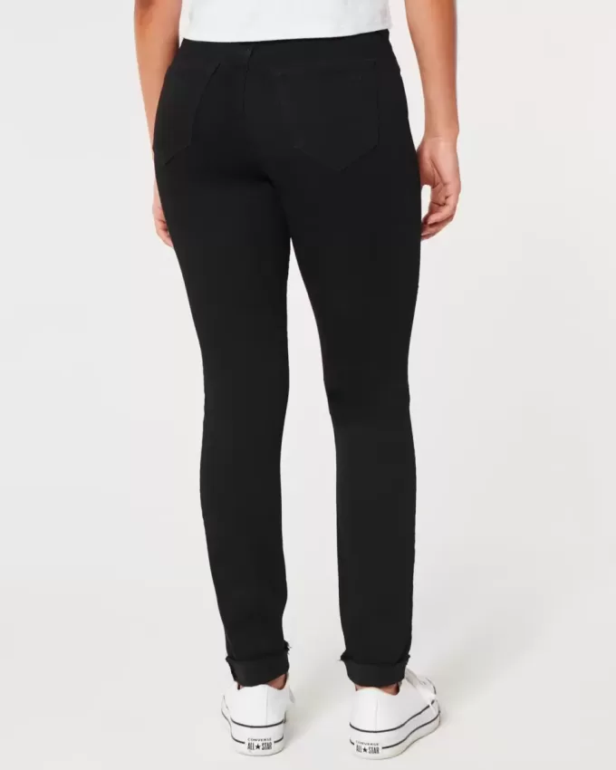 Leggings vaqueros negros rotos de tiro alto Leggings vaqueros negros rotos de tiro alto