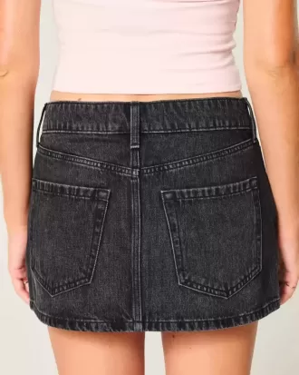 Minifalda vaquera negra lavada de tiro bajo