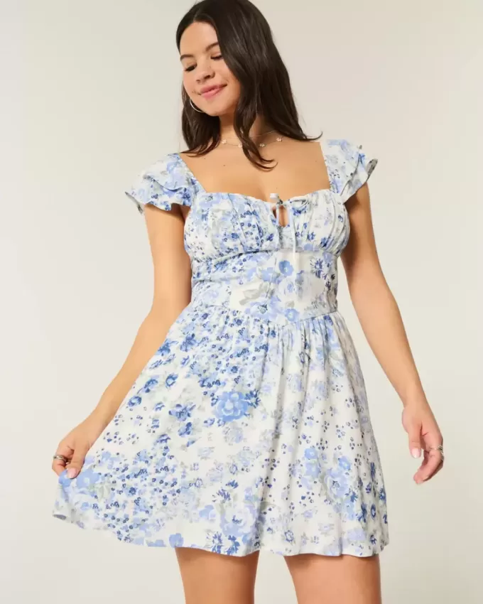 Minivestido con cintura en V y mangas onduladas