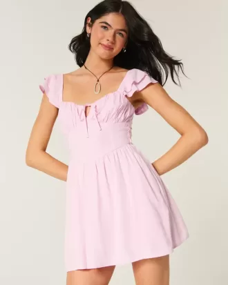 Minivestido con cintura en V y mangas onduladas