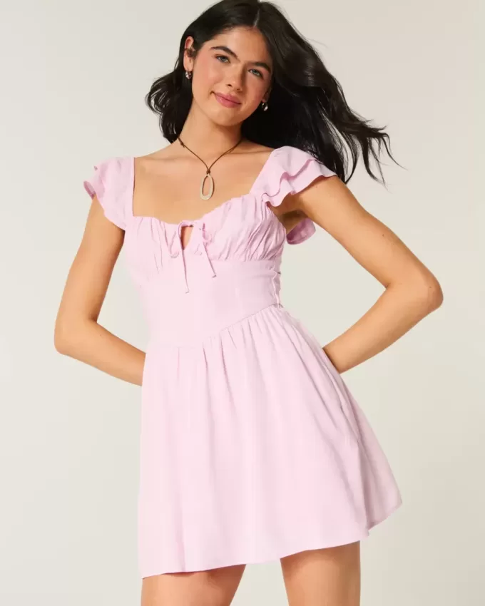 Minivestido con cintura en V y mangas onduladas