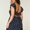Minivestido con cintura en V y mangas onduladas