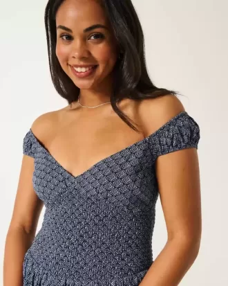 Minivestido con hombros descubiertos y dobladillo asimétrico