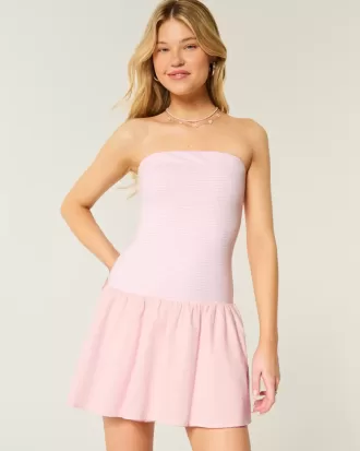 Minivestido de punto con cintura baja y sin tirantes