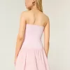 Minivestido de punto con cintura baja y sin tirantes Minivestido de punto con cintura baja y sin tirantes