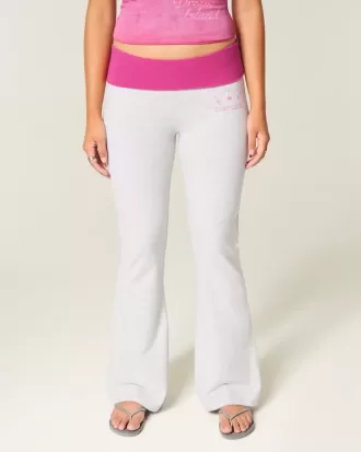 Pantalones acampanados con cintura plegable y estampado de hibisco