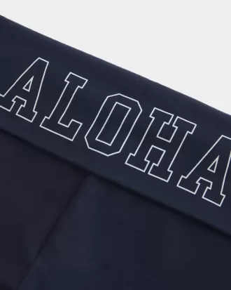 Pantalones acampanados con cintura plegable y estampado gráfico Aloha
