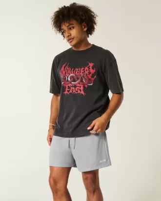 Pantalones cortos de fútbol con logotipo de punto hasta la mitad del muslo