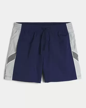 Pantalones cortos de fútbol hasta la mitad del muslo