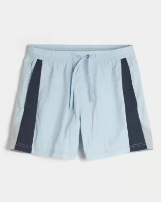 Pantalones cortos de fútbol hasta la mitad del muslo