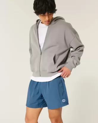 Pantalones cortos de fútbol holgados hasta la mitad del muslo