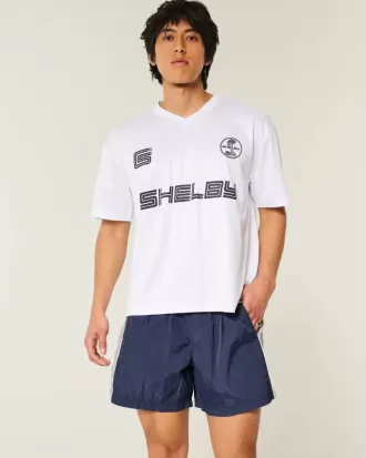 Pantalones cortos de fútbol holgados hasta la mitad del muslo