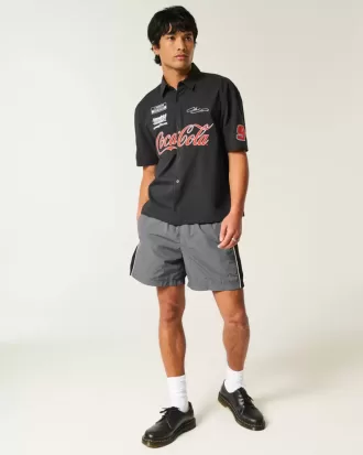 Pantalones cortos de fútbol holgados hasta la mitad del muslo