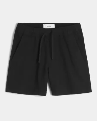 Pantalones cortos de lino hasta medio muslo
