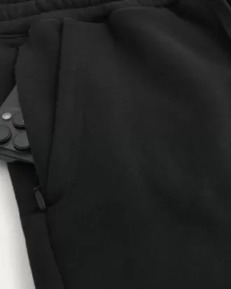 Pantalones cortos de polar hasta la mitad del muslo