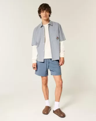 Pantalones cortos de polar holgados hasta la mitad del muslo