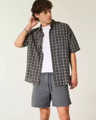 Pantalones cortos de sarga hasta medio muslo