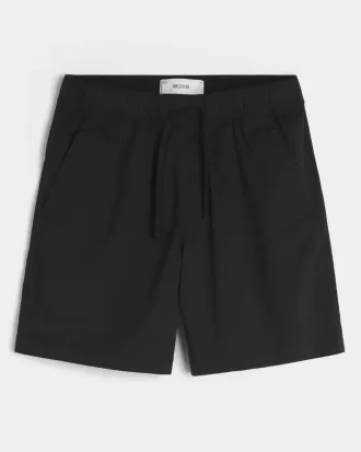 Pantalones cortos de sarga por encima de la rodilla