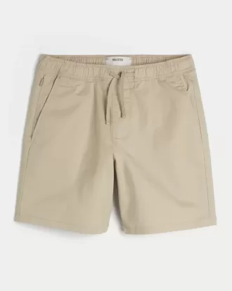 Pantalones cortos de sarga por encima de la rodilla