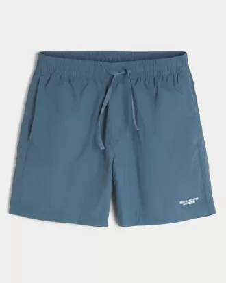 Pantalones cortos deportivos de nailon por encima de la rodilla