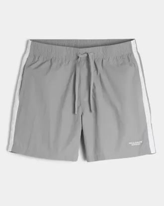 Pantalones cortos deportivos de nailon por encima de la rodilla