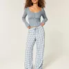 Pantalones de tiro alto Pantalones de tiro alto