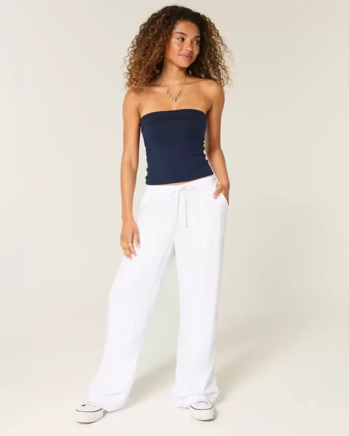 Pantalones de tiro alto Pantalones de tiro alto