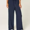 Pantalones de tiro alto Pantalones de tiro alto
