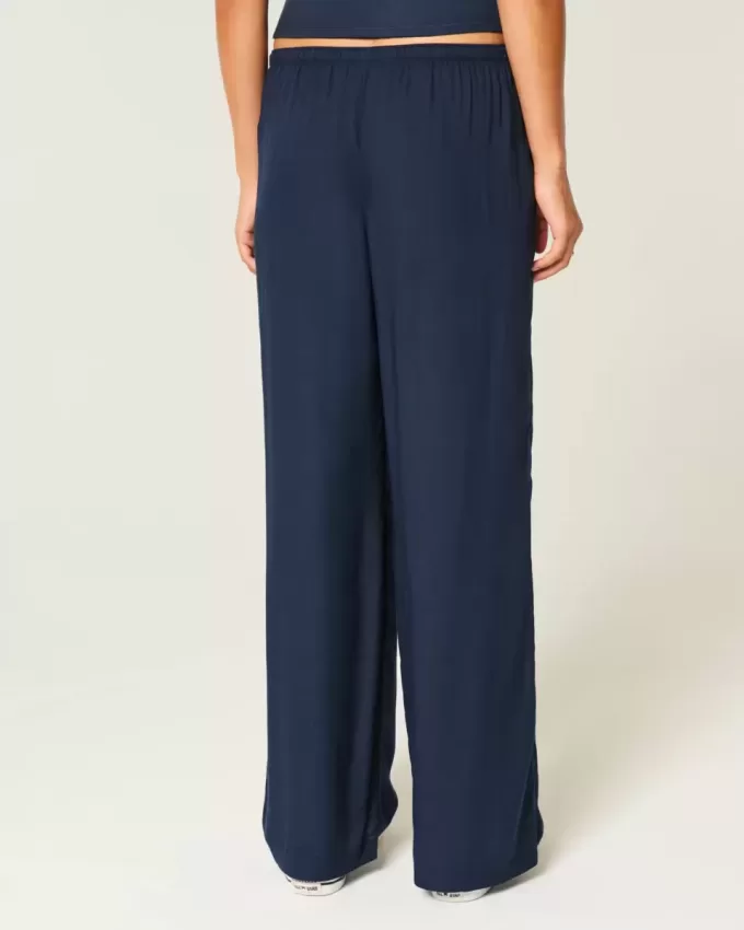 Pantalones de tiro alto Pantalones de tiro alto