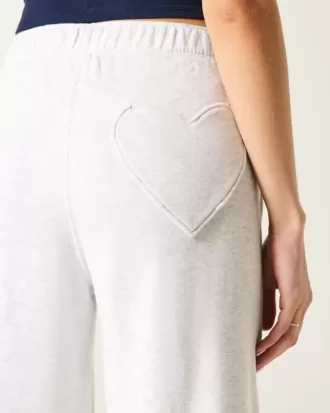 Pantalones deportivos anchos con bolsillo en forma de corazón
