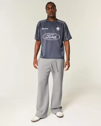 Pantalones deportivos de corte acampanado