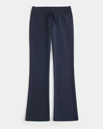 Pantalones deportivos de corte acampanado