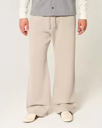 Pantalones deportivos de corte acampanado