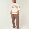 Pantalones deportivos holgados con cintura ceñida Pantalones deportivos holgados con cintura ceñida