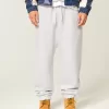 Pantalones deportivos holgados con cintura ceñida Pantalones deportivos holgados con cintura ceñida