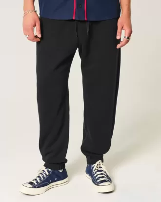 Pantalones deportivos holgados con cintura ceñida Pantalones deportivos holgados con cintura ceñida