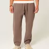 Pantalones deportivos holgados con cintura ceñida Pantalones deportivos holgados con cintura ceñida