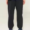 Pantalones deportivos holgados con cintura ceñida Pantalones deportivos holgados con cintura ceñida