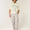 Pantalones deportivos holgados con cintura ceñida Pantalones deportivos holgados con cintura ceñida
