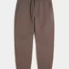Pantalones deportivos holgados con cintura ceñida Pantalones deportivos holgados con cintura ceñida